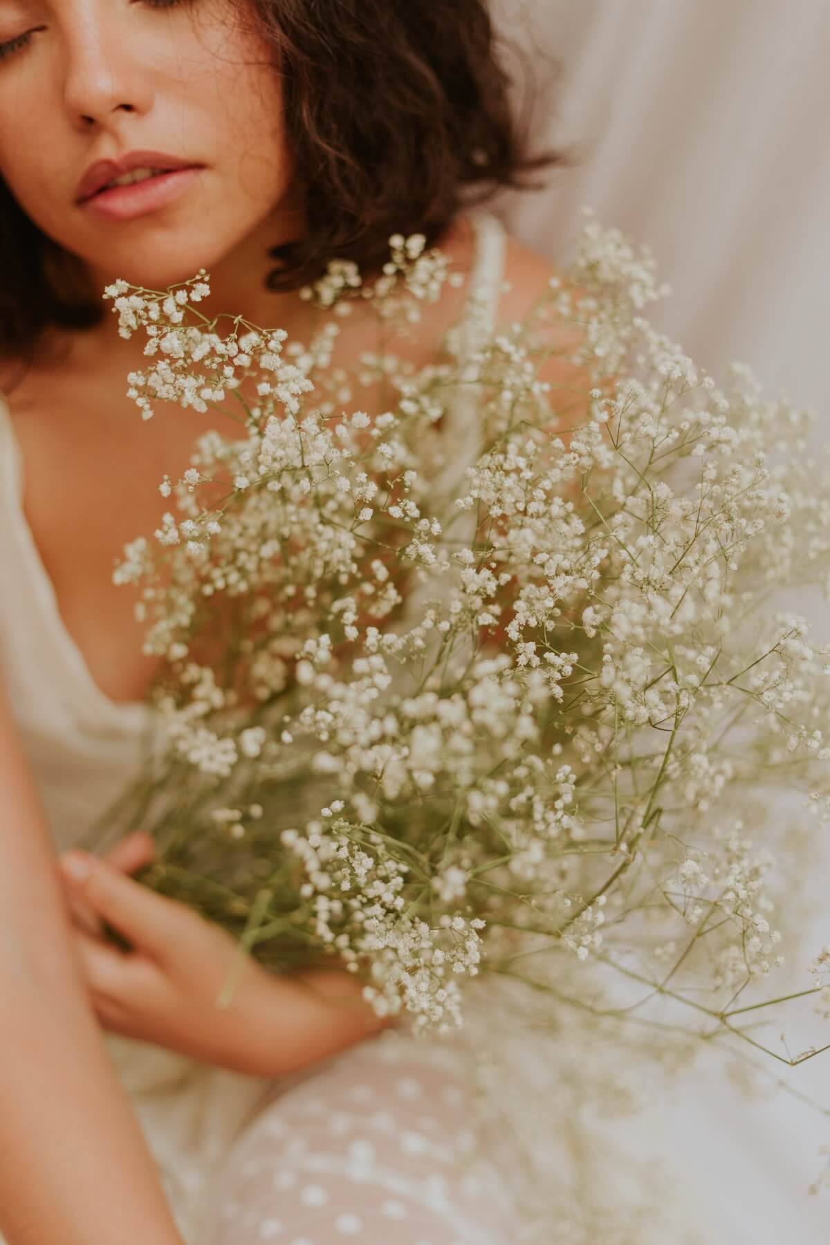 Woman with bouquet.